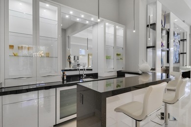 Spectacular 1-story residence by Mustapick Homes on a .39 acre on Old Palm Golf Club in Florida - for sale on GolfHomes.com, golf home, golf lot