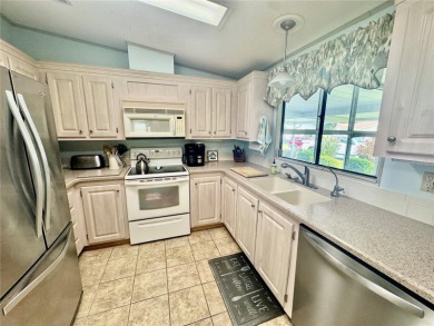 Welcome to Your Florida Retreat! This immaculate home offers a on Plantation Golf Club in Florida - for sale on GolfHomes.com, golf home, golf lot