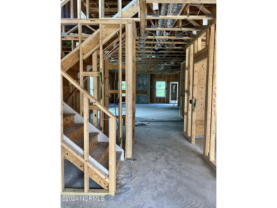 Photos are of a similar home in the same community. This brick on Lennon Hills Golf Course in North Carolina - for sale on GolfHomes.com, golf home, golf lot