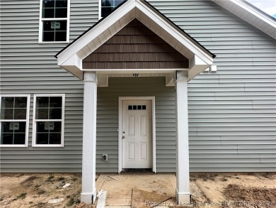 This 3 bedroom,2.5 bath townhome is located in The Ridges inside on Kings Grant Golf and Country Club in North Carolina - for sale on GolfHomes.com, golf home, golf lot