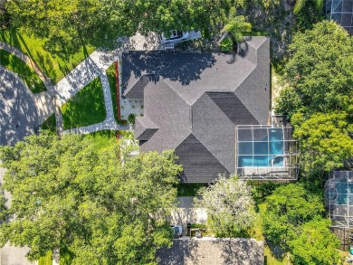 Welcome to a masterpiece of modern design and refined living in on Tuscawilla Country Club in Florida - for sale on GolfHomes.com, golf home, golf lot