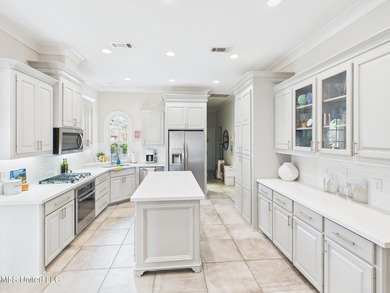 Beautiful home perfect for a family or individual looking to on Lake Caroline Golf Club in Mississippi - for sale on GolfHomes.com, golf home, golf lot