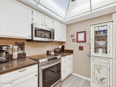 A lovely updated Pueblo model garden apartment in the heart of on Deer Valley Golf Course in Arizona - for sale on GolfHomes.com, golf home, golf lot