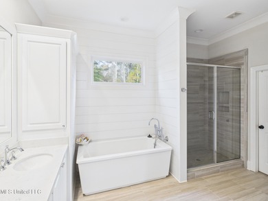 Beautiful home perfect for a family or individual looking to on Lake Caroline Golf Club in Mississippi - for sale on GolfHomes.com, golf home, golf lot