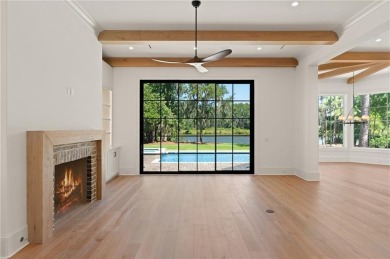 Step into a world of refined elegance with this stunning on Frederica Golf Club in Georgia - for sale on GolfHomes.com, golf home, golf lot
