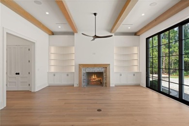 Step into a world of refined elegance with this stunning on Frederica Golf Club in Georgia - for sale on GolfHomes.com, golf home, golf lot