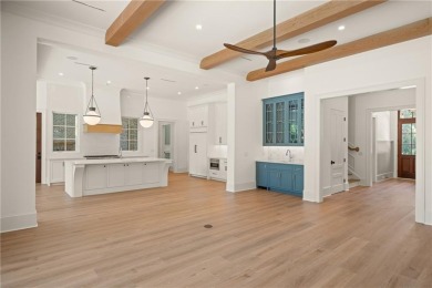 Step into a world of refined elegance with this stunning on Frederica Golf Club in Georgia - for sale on GolfHomes.com, golf home, golf lot