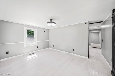 Welcome to this fully renovated 3-bedroom, 2-bath smart home on Village Green Golf Course in Ohio - for sale on GolfHomes.com, golf home, golf lot