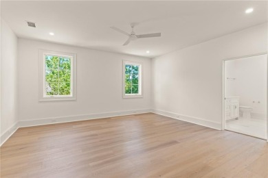 Step into a world of refined elegance with this stunning on Frederica Golf Club in Georgia - for sale on GolfHomes.com, golf home, golf lot
