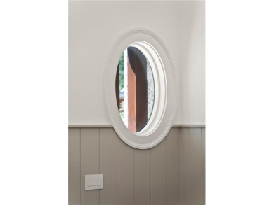 Step into a world of refined elegance with this stunning on Frederica Golf Club in Georgia - for sale on GolfHomes.com, golf home, golf lot