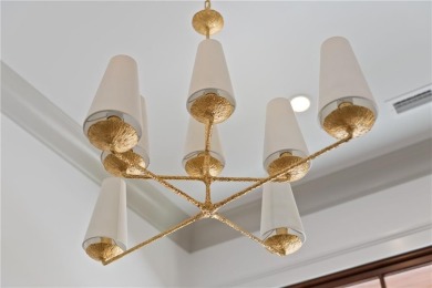 Step into a world of refined elegance with this stunning on Frederica Golf Club in Georgia - for sale on GolfHomes.com, golf home, golf lot