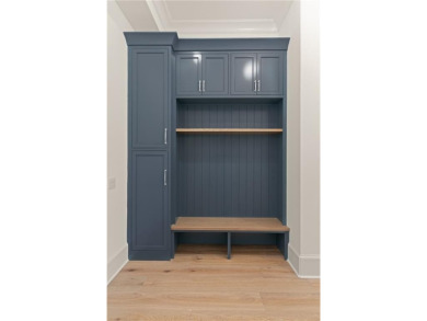 Step into a world of refined elegance with this stunning on Frederica Golf Club in Georgia - for sale on GolfHomes.com, golf home, golf lot