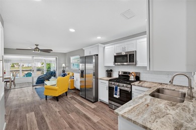 UNOBSTRUCTED GULF ACCESS. PRIVATE BEACH. CUTE AS A BUTTON on Gulf Harbors Golf Course in Florida - for sale on GolfHomes.com, golf home, golf lot