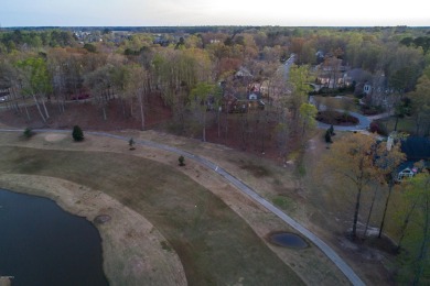 Build your dream house on this beautiful, hilly lot overlooking on Ironwood Golf and Country Club in North Carolina - for sale on GolfHomes.com, golf home, golf lot