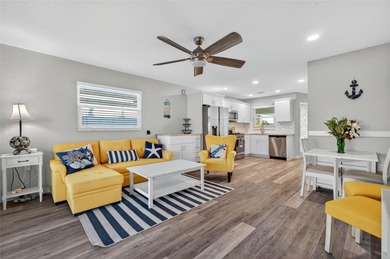 UNOBSTRUCTED GULF ACCESS. PRIVATE BEACH. CUTE AS A BUTTON on Gulf Harbors Golf Course in Florida - for sale on GolfHomes.com, golf home, golf lot