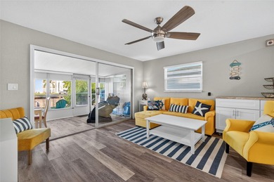 UNOBSTRUCTED GULF ACCESS. PRIVATE BEACH. CUTE AS A BUTTON on Gulf Harbors Golf Course in Florida - for sale on GolfHomes.com, golf home, golf lot