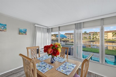 UNOBSTRUCTED GULF ACCESS. PRIVATE BEACH. CUTE AS A BUTTON on Gulf Harbors Golf Course in Florida - for sale on GolfHomes.com, golf home, golf lot