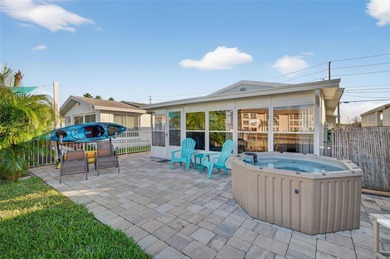 UNOBSTRUCTED GULF ACCESS. PRIVATE BEACH. CUTE AS A BUTTON on Gulf Harbors Golf Course in Florida - for sale on GolfHomes.com, golf home, golf lot