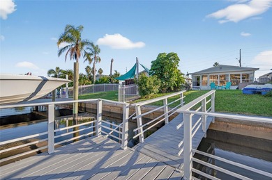 UNOBSTRUCTED GULF ACCESS. PRIVATE BEACH. CUTE AS A BUTTON on Gulf Harbors Golf Course in Florida - for sale on GolfHomes.com, golf home, golf lot