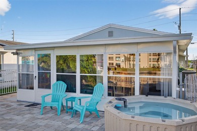 UNOBSTRUCTED GULF ACCESS. PRIVATE BEACH. CUTE AS A BUTTON on Gulf Harbors Golf Course in Florida - for sale on GolfHomes.com, golf home, golf lot