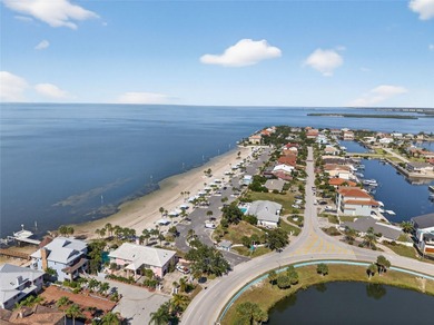 UNOBSTRUCTED GULF ACCESS. PRIVATE BEACH. CUTE AS A BUTTON on Gulf Harbors Golf Course in Florida - for sale on GolfHomes.com, golf home, golf lot