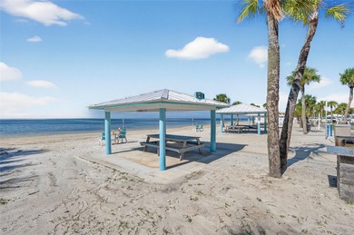 UNOBSTRUCTED GULF ACCESS. PRIVATE BEACH. CUTE AS A BUTTON on Gulf Harbors Golf Course in Florida - for sale on GolfHomes.com, golf home, golf lot
