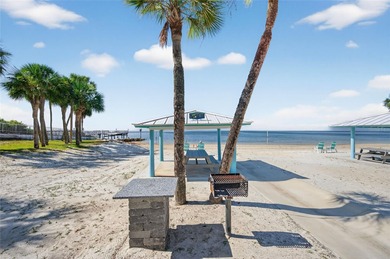 UNOBSTRUCTED GULF ACCESS. PRIVATE BEACH. CUTE AS A BUTTON on Gulf Harbors Golf Course in Florida - for sale on GolfHomes.com, golf home, golf lot