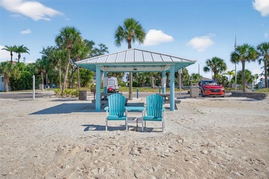 UNOBSTRUCTED GULF ACCESS. PRIVATE BEACH. CUTE AS A BUTTON on Gulf Harbors Golf Course in Florida - for sale on GolfHomes.com, golf home, golf lot