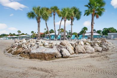 UNOBSTRUCTED GULF ACCESS. PRIVATE BEACH. CUTE AS A BUTTON on Gulf Harbors Golf Course in Florida - for sale on GolfHomes.com, golf home, golf lot