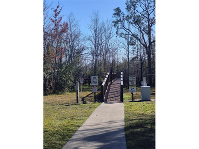 PRICED BELOW APPRAISAL!    SINGLE STORY, POOL & HEATED SPA home on North Shore Golf Club in Florida - for sale on GolfHomes.com, golf home, golf lot