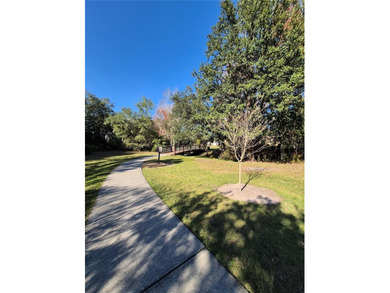 PRICED BELOW APPRAISAL!    SINGLE STORY, POOL & HEATED SPA home on North Shore Golf Club in Florida - for sale on GolfHomes.com, golf home, golf lot