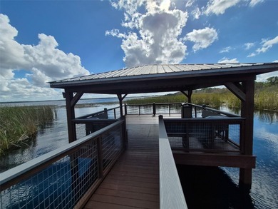 PRICED BELOW APPRAISAL!    SINGLE STORY, POOL & HEATED SPA home on North Shore Golf Club in Florida - for sale on GolfHomes.com, golf home, golf lot