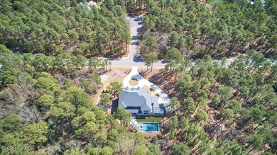 Discover unparalleled luxury at 106 Haddington Drive, a on Forest Creek Golf Club  in North Carolina - for sale on GolfHomes.com, golf home, golf lot