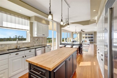 Indulge in the epitome of luxury living in this 3 bedroom (all on Longboat Key Golf Club in Florida - for sale on GolfHomes.com, golf home, golf lot