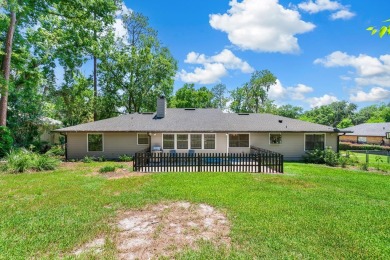 Welcome to this spacious 4-bedroom, 2-bath home located in the on Gainesville Golf and Country Club in Florida - for sale on GolfHomes.com, golf home, golf lot