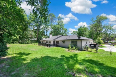 Welcome to this spacious 4-bedroom, 2-bath home located in the on Gainesville Golf and Country Club in Florida - for sale on GolfHomes.com, golf home, golf lot