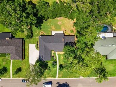 Welcome to this spacious 4-bedroom, 2-bath home located in the on Gainesville Golf and Country Club in Florida - for sale on GolfHomes.com, golf home, golf lot