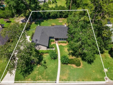 Welcome to this spacious 4-bedroom, 2-bath home located in the on Gainesville Golf and Country Club in Florida - for sale on GolfHomes.com, golf home, golf lot