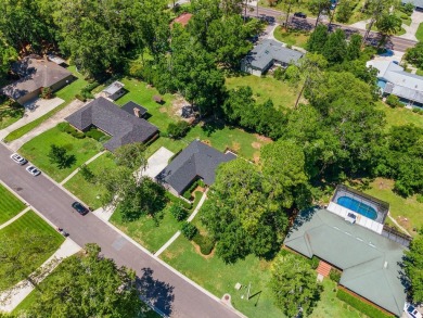 Welcome to this spacious 4-bedroom, 2-bath home located in the on Gainesville Golf and Country Club in Florida - for sale on GolfHomes.com, golf home, golf lot