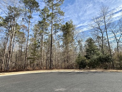 This spacious 0.57-acre homesite is beautifully wooded and on The Golf Club At Cedar Creek in South Carolina - for sale on GolfHomes.com, golf home, golf lot