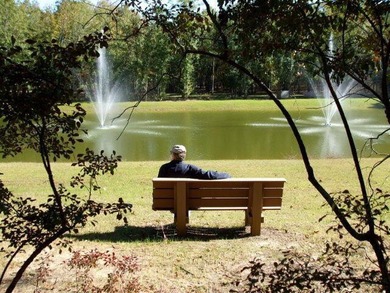 This spacious 0.57-acre homesite is beautifully wooded and on The Golf Club At Cedar Creek in South Carolina - for sale on GolfHomes.com, golf home, golf lot