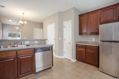 This end-unit townhome offers 3 bedrooms and 2.5 bathrooms, with on World Tour Golf Links in South Carolina - for sale on GolfHomes.com, golf home, golf lot