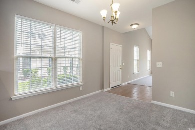 This end-unit townhome offers 3 bedrooms and 2.5 bathrooms, with on World Tour Golf Links in South Carolina - for sale on GolfHomes.com, golf home, golf lot