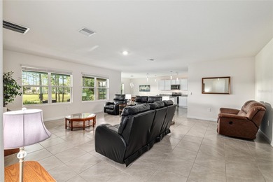 Light flows gracefully through every room of this elegant on Lake Diamond Golf and Country Club in Florida - for sale on GolfHomes.com, golf home, golf lot