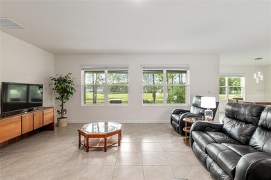 Light flows gracefully through every room of this elegant on Lake Diamond Golf and Country Club in Florida - for sale on GolfHomes.com, golf home, golf lot