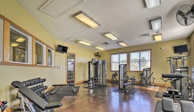 OWN YOUR PLACE AT THE BEACH-Rare Third Floor Opportunity! on Crow Creek Golf Club in North Carolina - for sale on GolfHomes.com, golf home, golf lot