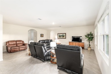 Light flows gracefully through every room of this elegant on Lake Diamond Golf and Country Club in Florida - for sale on GolfHomes.com, golf home, golf lot