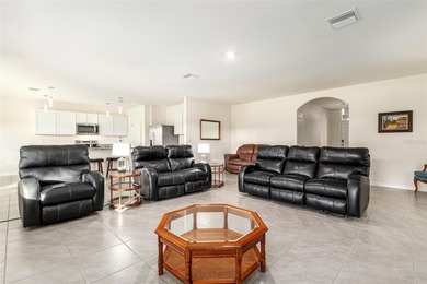 Light flows gracefully through every room of this elegant on Lake Diamond Golf and Country Club in Florida - for sale on GolfHomes.com, golf home, golf lot