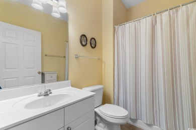 Discover this beautifully maintained top-floor condo nestled in on Barefoot Resort and Golf Club  in South Carolina - for sale on GolfHomes.com, golf home, golf lot