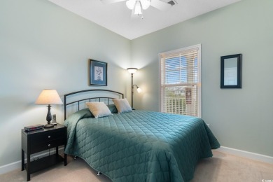 Discover this beautifully maintained top-floor condo nestled in on Barefoot Resort and Golf Club  in South Carolina - for sale on GolfHomes.com, golf home, golf lot
